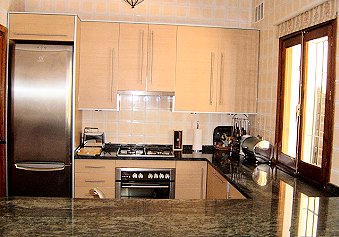 Modern kitchen with all amenities at Mijas Golf