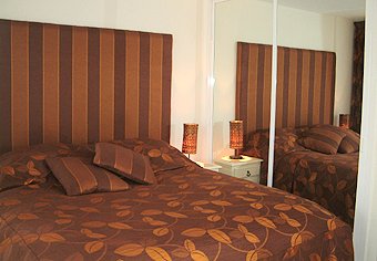 Master bedroom with King size bed at Parque Miraflores.
