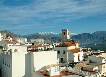 Salobrena roof tops and view to the Sierra Nevada